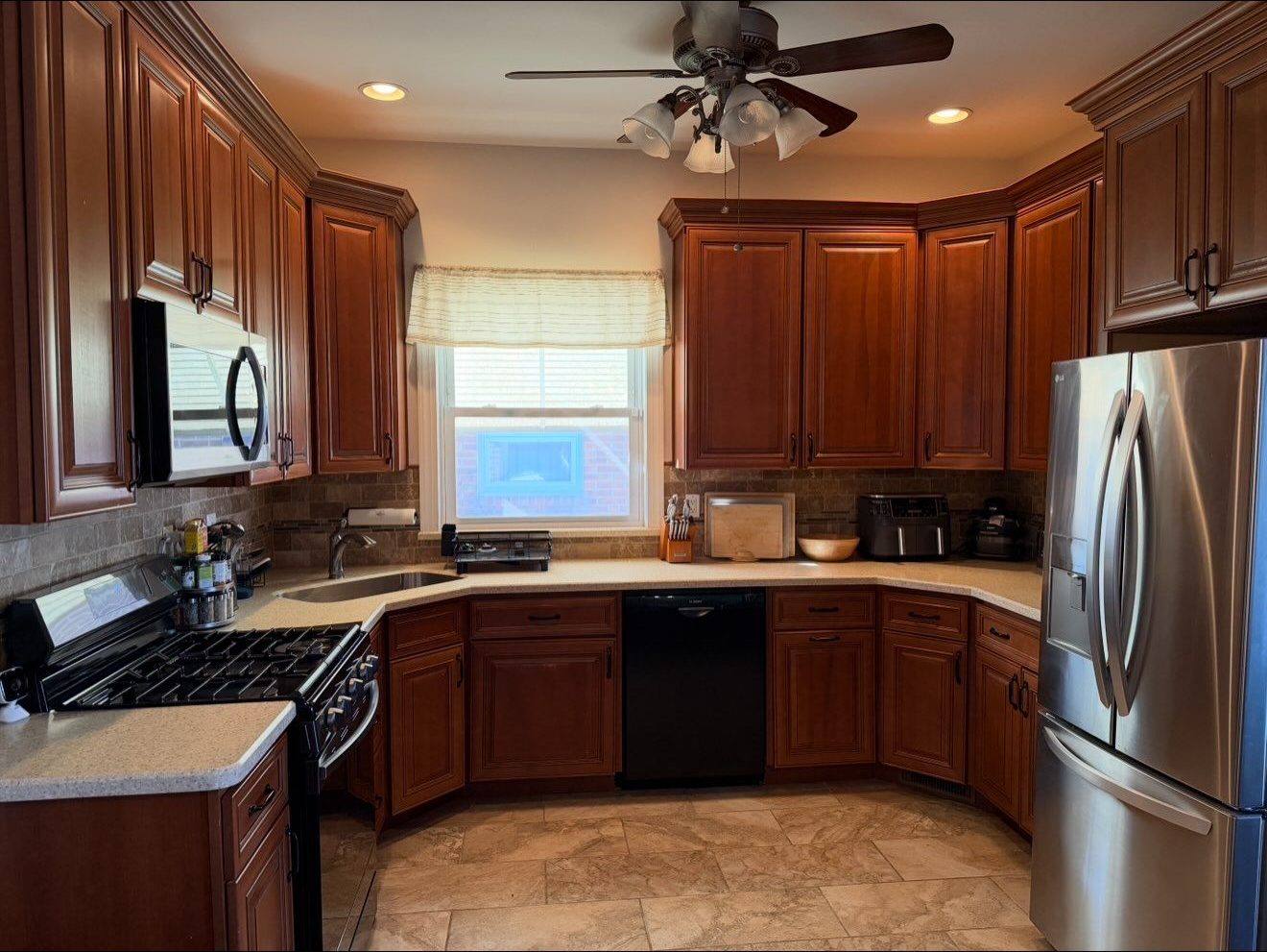 kitchen with wood cabinets, after cleaning